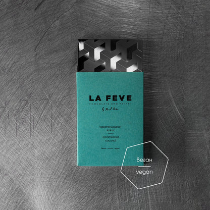 Teal chocolate bar packaging on a textured gray background