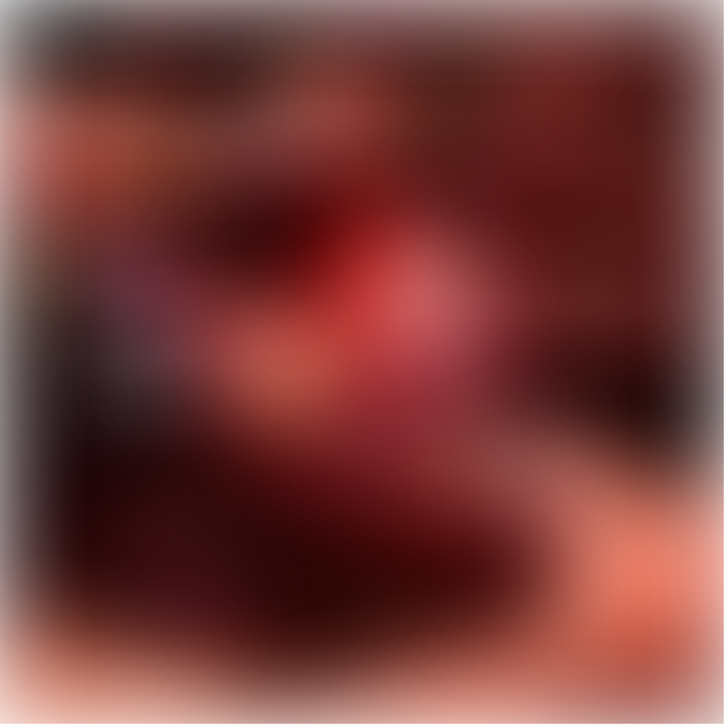 Blurred image of a heart chocolate with red background