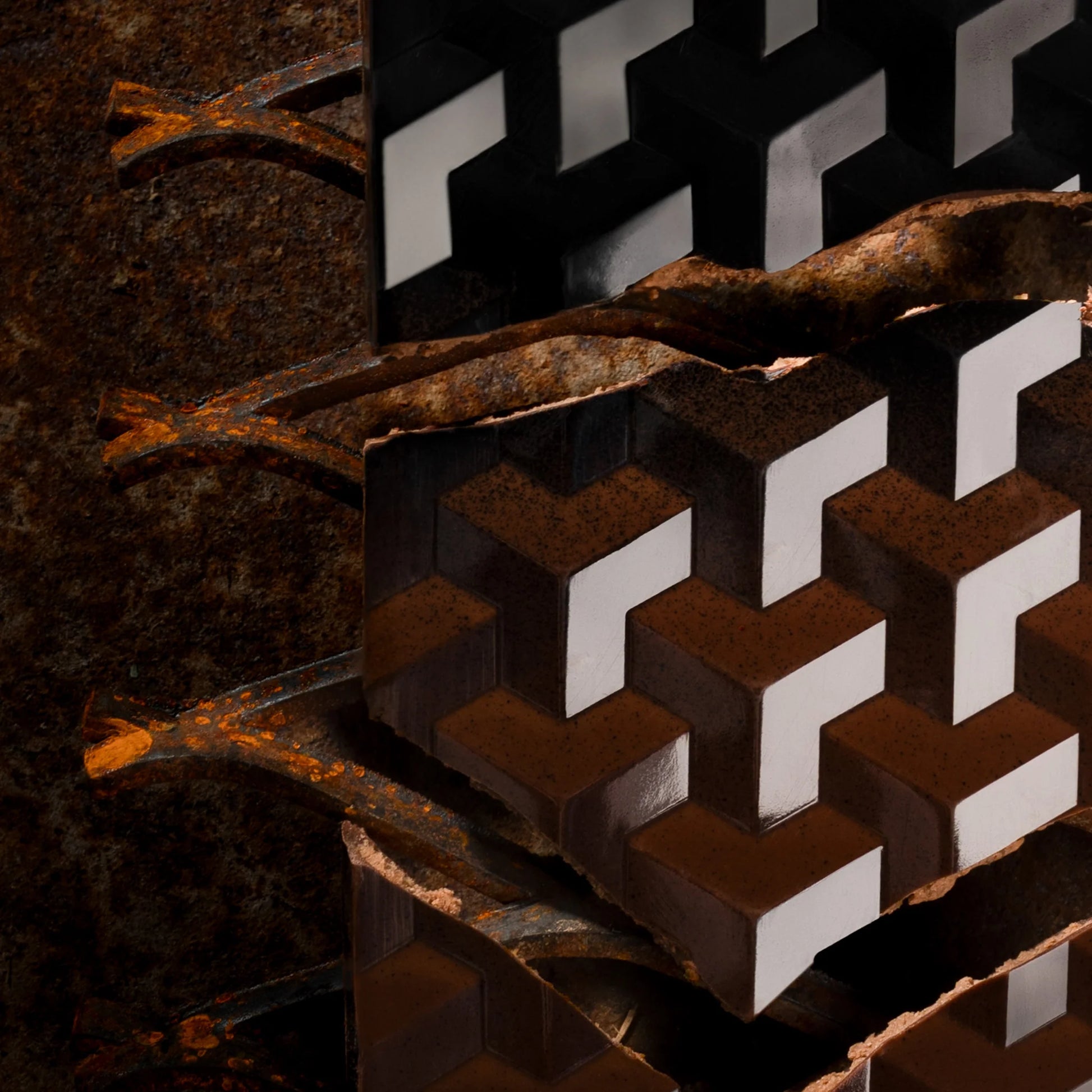 Close-up of a brown chocolate bar with geometric patterned onstructure with a dark background